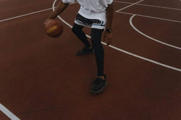 basketball player dribbling ball